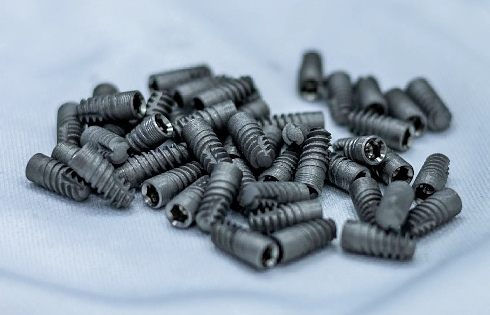 Finished GDT dental implant bodies manufactured from Titanium Grade 5 material.