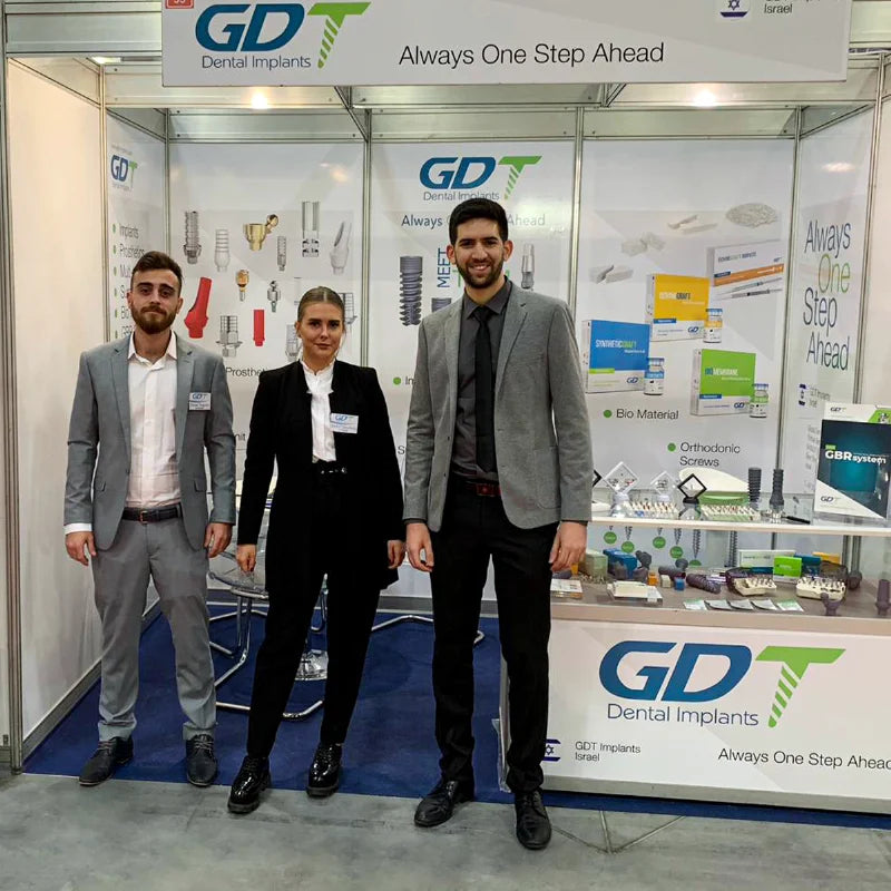 GDT Dental Implants team presenting products at the DENTA 2019 exhibition booth in Bucharest, Romania.