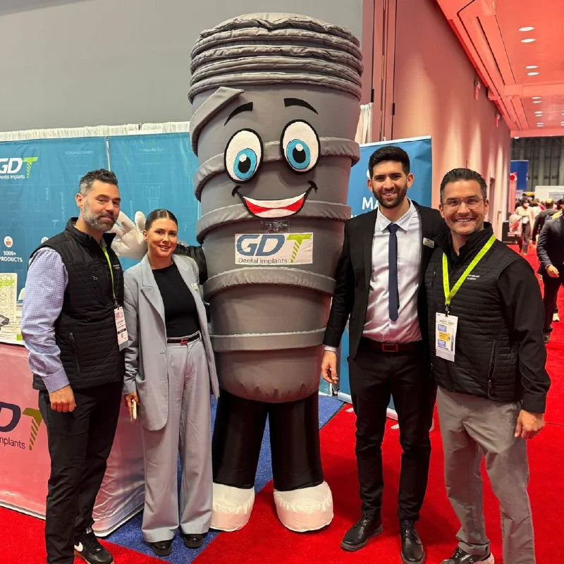 GDT Dental Implants team at the GNYDM 2024 exhibition booth in New York, USA.